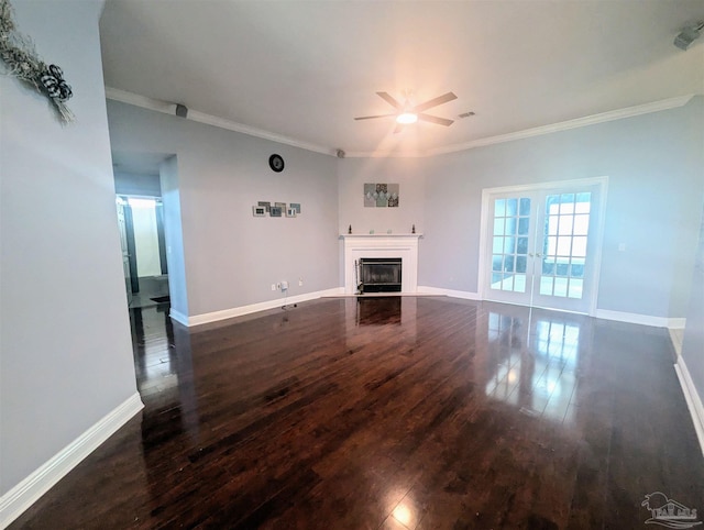 unfurnished living room featuring french doors, ceiling fan, dark hardwood / wood-style floors, and crown molding