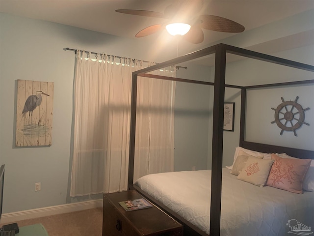 bedroom featuring ceiling fan and carpet floors