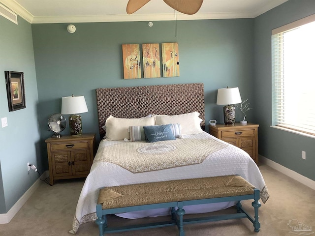 bedroom featuring light colored carpet and ornamental molding