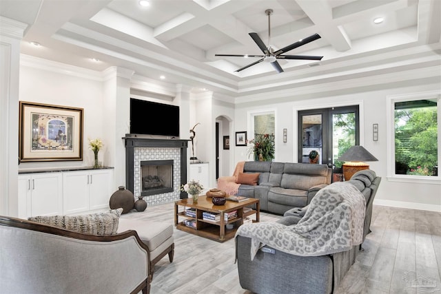 8780 Spider Lily Way, Pensacola, FL 32526 - living area with arched walkways, recessed lighting, light wood-type flooring, and coffered ceiling
