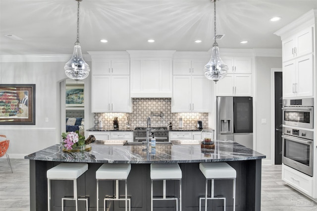 8780 Spider Lily Way, Pensacola, FL 32526 - kitchen featuring recessed lighting, decorative backsplash, baseboards, and stainless steel appliances