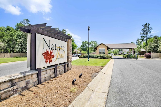 8780 Spider Lily Way, Pensacola, FL 32526 - community / neighborhood sign with fence