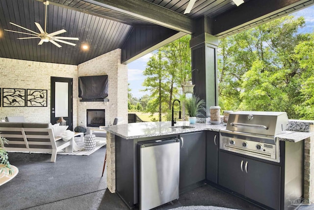 8780 Spider Lily Way, Pensacola, FL 32526 - view of patio / terrace featuring ceiling fan, a sink, area for grilling, an outdoor kitchen, and an outdoor living space with a fireplace