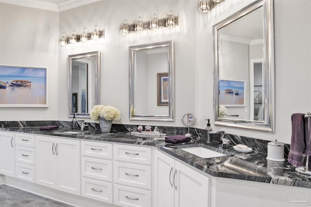 8780 Spider Lily Way, Pensacola, FL 32526 - bathroom featuring crown molding, double vanity, and a sink