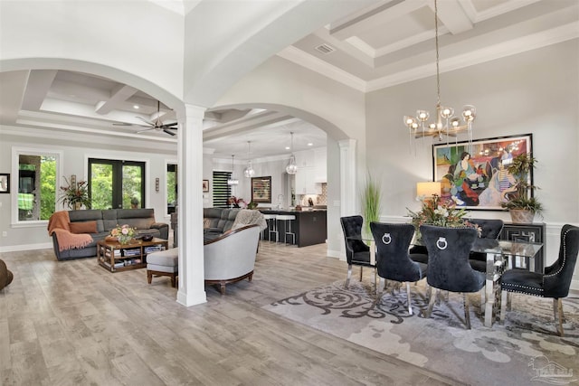 8780 Spider Lily Way, Pensacola, FL 32526 - dining area with beamed ceiling, ceiling fan with notable chandelier, and coffered ceiling