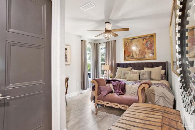 8780 Spider Lily Way, Pensacola, FL 32526 - bedroom featuring baseboards, light wood-style flooring, ceiling fan, and visible vents