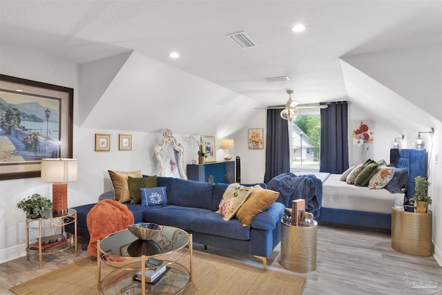 8780 Spider Lily Way, Pensacola, FL 32526 - bedroom with visible vents, baseboards, light wood-style flooring, and lofted ceiling