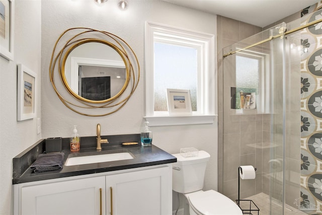 8780 Spider Lily Way, Pensacola, FL 32526 - full bathroom featuring vanity, a shower stall, and toilet
