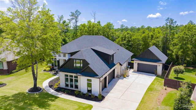 8780 Spider Lily Way, Pensacola, FL 32526 - exterior space with a shingled roof, an attached garage, concrete driveway, and a front yard