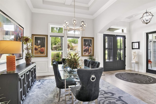 8780 Spider Lily Way, Pensacola, FL 32526 - dining area featuring an inviting chandelier, wood finished floors, and a wealth of natural light