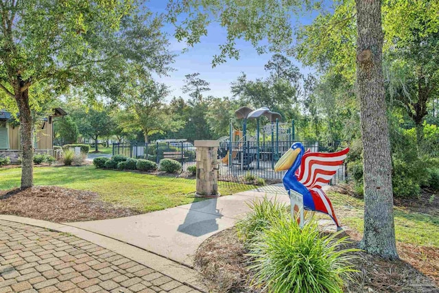 8780 Spider Lily Way, Pensacola, FL 32526 - community playground with fence and a yard