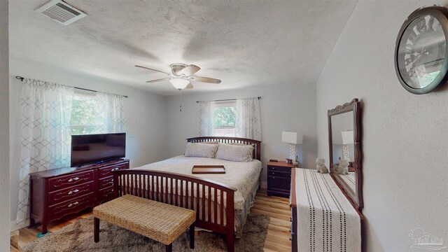 200 Talladega Trl, Pensacola, FL 32506 - bedroom featuring light wood-style floors and a ceiling fan