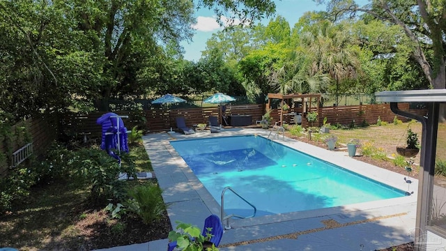 200 Talladega Trl, Pensacola, FL 32506 - view of pool featuring a fenced backyard, a patio, and view of wooded area