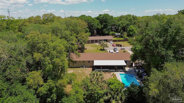 200 Talladega Trl, Pensacola, FL 32506 - aerial view of property and surrounding area with a pool area and a heavily wooded area