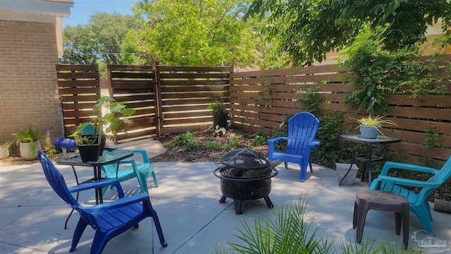 200 Talladega Trl, Pensacola, FL 32506 - view of patio with a fenced backyard and an outdoor fire pit