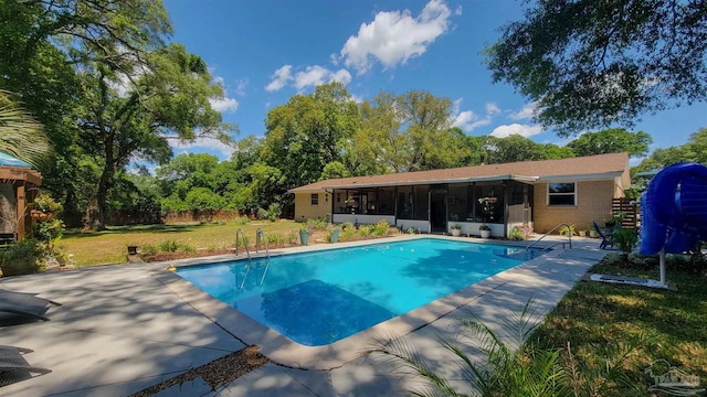 200 Talladega Trl, Pensacola, FL 32506 - outdoor pool featuring a sunroom and a patio area