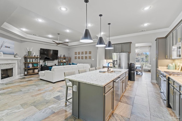 1397 Sabal Palm Dr, Gulf Breeze, FL 32563 - kitchen with visible vents, ornamental molding, a sink, gray cabinetry, and stainless steel appliances