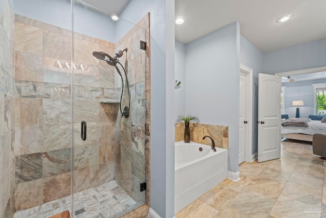 1397 Sabal Palm Dr, Gulf Breeze, FL 32563 - ensuite bathroom with a garden tub, baseboards, recessed lighting, connected bathroom, and a shower stall