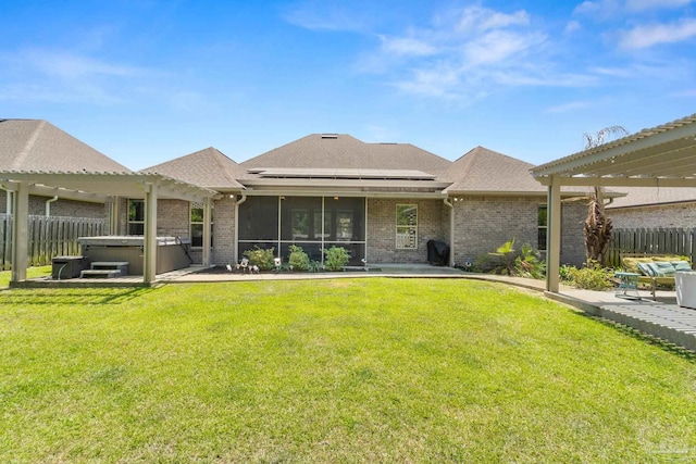 1397 Sabal Palm Dr, Gulf Breeze, FL 32563 - rear view of property with solar panels, a patio area, a hot tub, brick siding, and a pergola