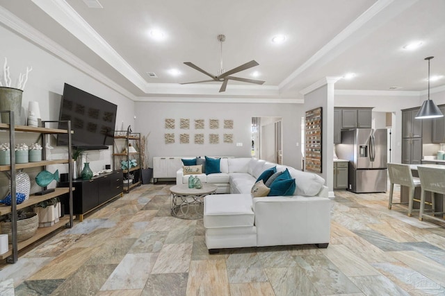 1397 Sabal Palm Dr, Gulf Breeze, FL 32563 - living area with ceiling fan, decorative columns, ornamental molding, and a raised ceiling
