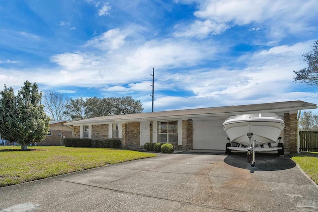 ranch-style house featuring driveway, brick siding, an attached garage, fence, and a front yard