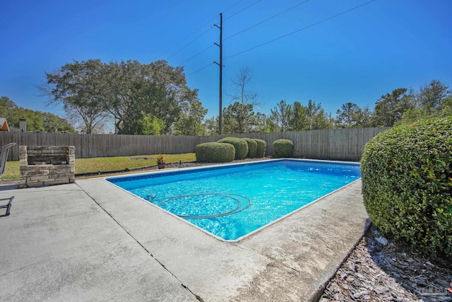 view of pool featuring a fenced in pool, a fenced backyard, and a patio