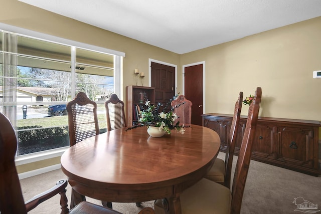 dining space with carpet floors