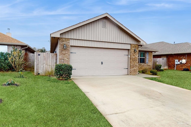 ranch-style home featuring a garage and a front lawn