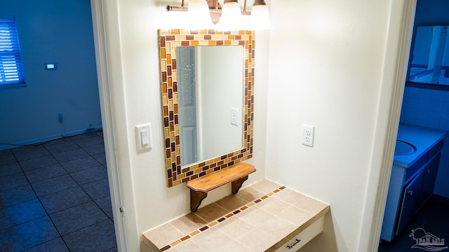 bathroom with tile patterned flooring