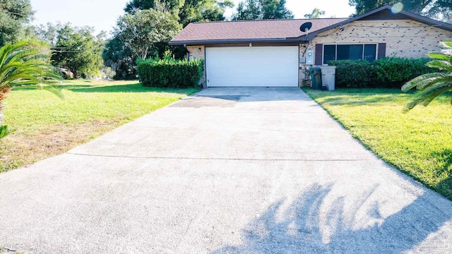 single story home with a front yard and a garage