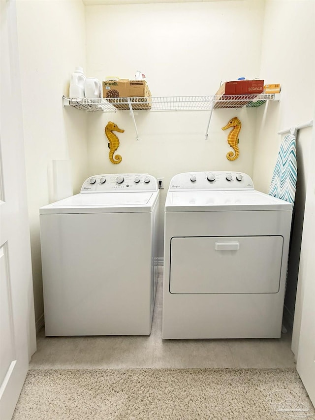 clothes washing area with laundry area and washing machine and dryer