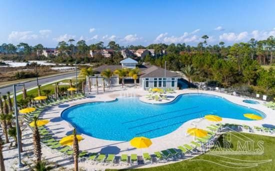 community pool with a patio