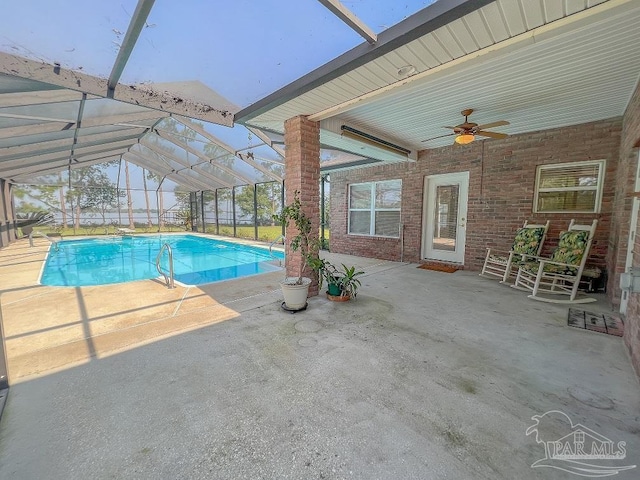 3615 Ward Basin Rd, Milton, FL 32583 - outdoor pool featuring a patio area, a ceiling fan, and glass enclosure