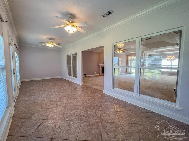 unfurnished sunroom featuring ceiling fan with notable chandelier