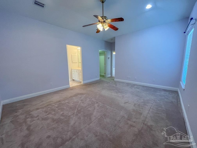 3615 Ward Basin Rd, Milton, FL 32583 - unfurnished bedroom with baseboards, carpet floors, ensuite bathroom, and a ceiling fan