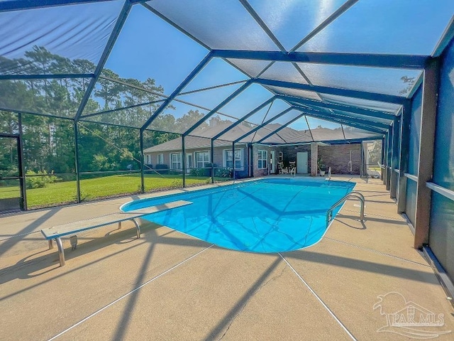3615 Ward Basin Rd, Milton, FL 32583 - outdoor pool with a patio, glass enclosure, and a diving board
