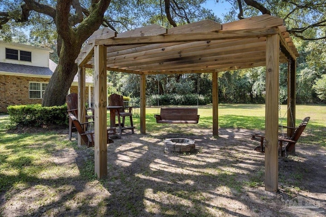 view of yard featuring a fire pit