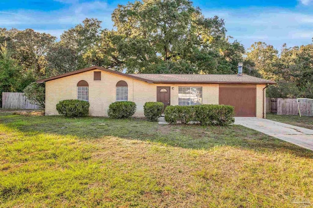 ranch-style home featuring a front yard