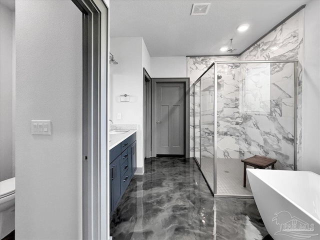 full bathroom featuring toilet, vanity, shower with separate bathtub, and a textured ceiling