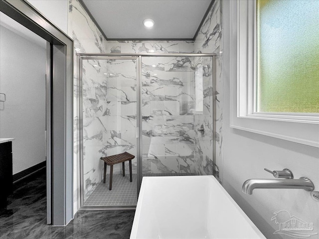 bathroom with ornamental molding and an enclosed shower