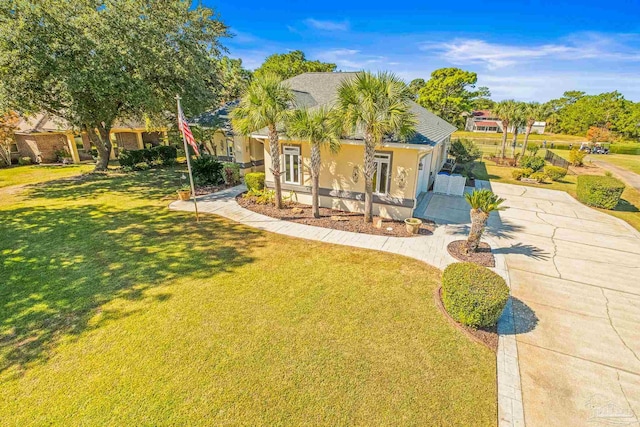 view of front of home with a front yard