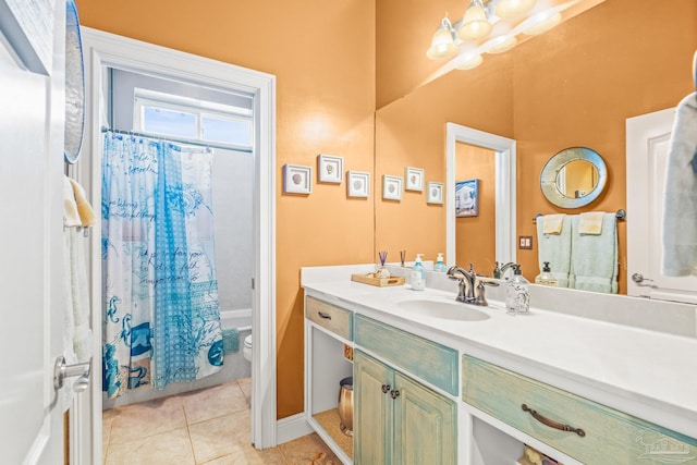 full bathroom with vanity, shower / tub combo with curtain, toilet, and tile patterned flooring