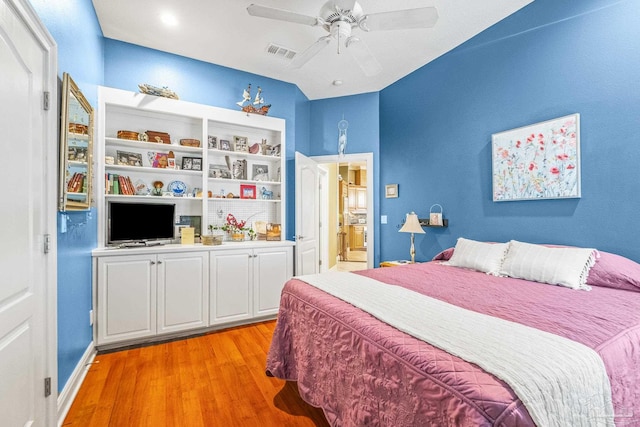 bedroom featuring ceiling fan and light hardwood / wood-style flooring