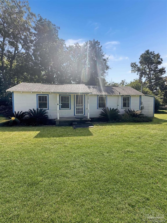 3020 Woodbury Cir, Cantonment, FL 32533 - ranch-style home with a front yard and a porch
