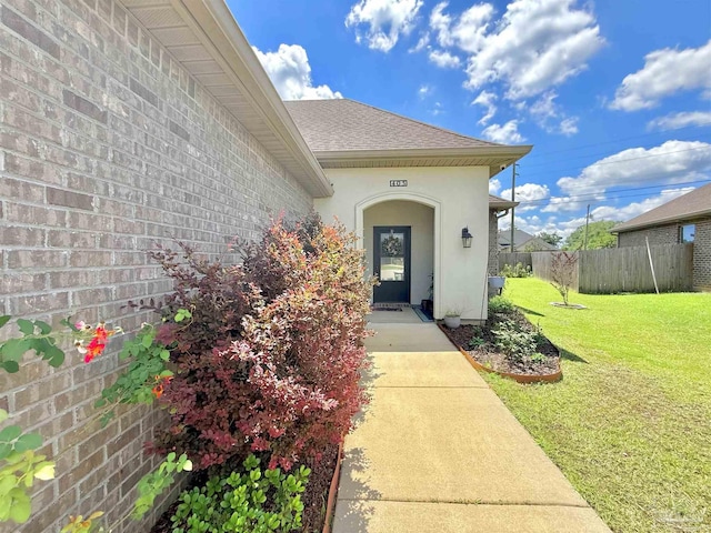 405 Waterbury Ct, Cantonment, FL 32533 - entrance to property with stucco siding and roof with shingles