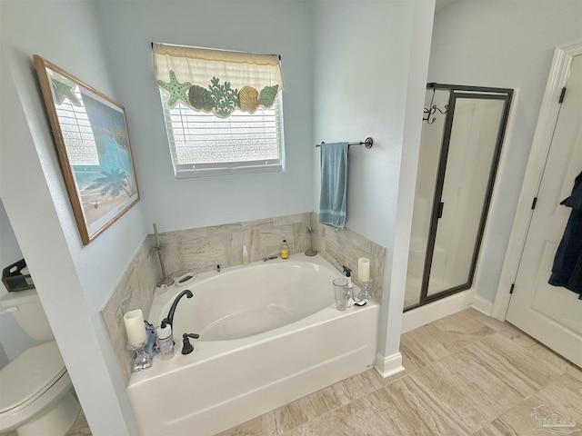 405 Waterbury Ct, Cantonment, FL 32533 - bathroom with a bath, a shower stall, and toilet