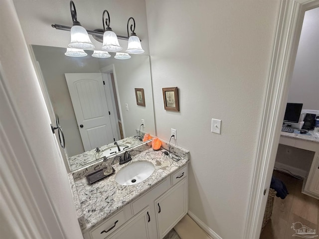 405 Waterbury Ct, Cantonment, FL 32533 - bathroom featuring vanity and baseboards