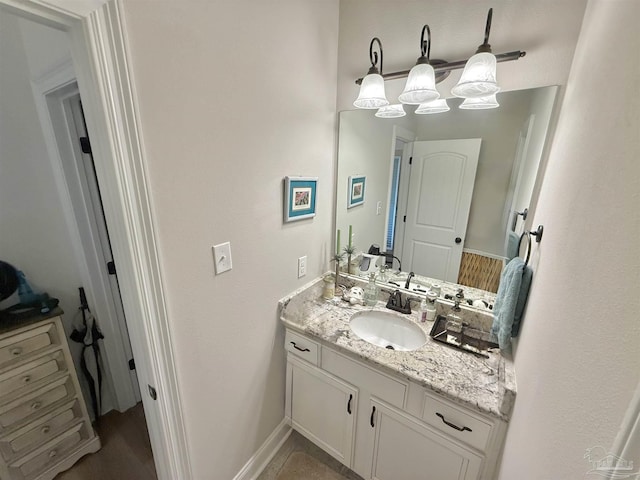 405 Waterbury Ct, Cantonment, FL 32533 - bathroom with vanity and baseboards