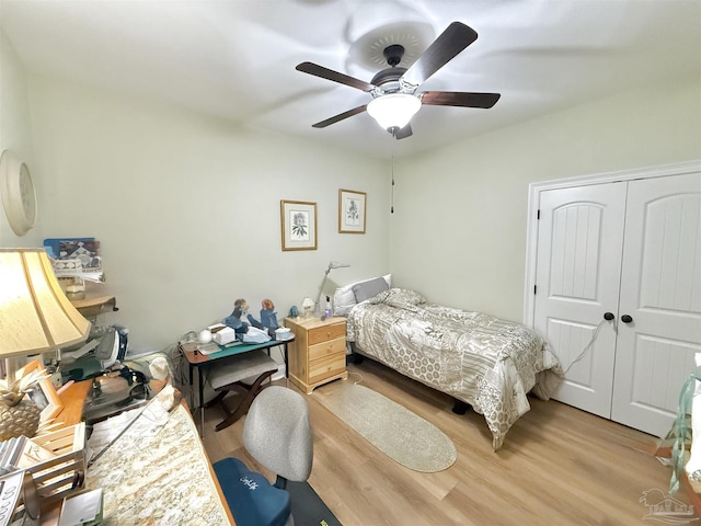 405 Waterbury Ct, Cantonment, FL 32533 - bedroom featuring light wood finished floors, a closet, and a ceiling fan