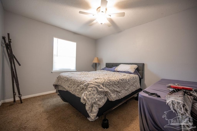 8687 John Hamm Rd, Milton, FL 32583 - bedroom featuring carpet, ceiling fan, and baseboards